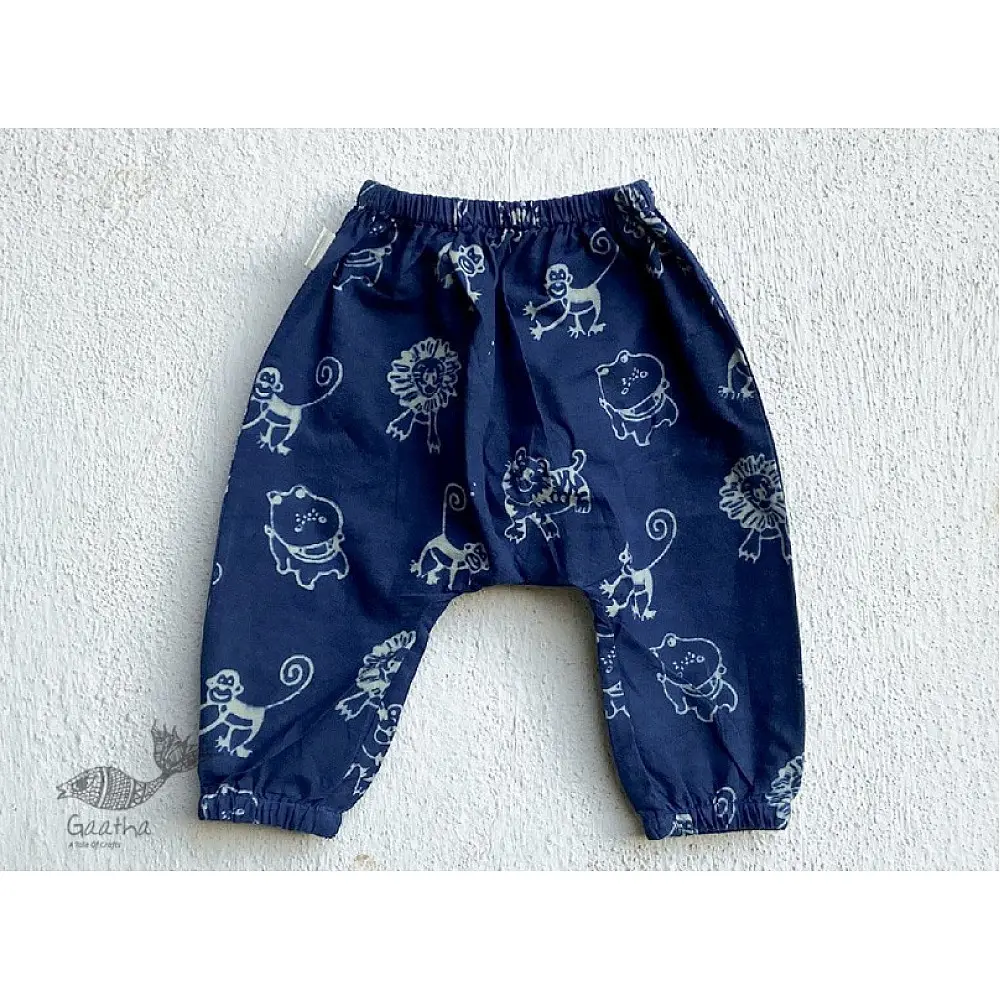 white organic cotton kids shirt paired with indigo blue elephant printed pants