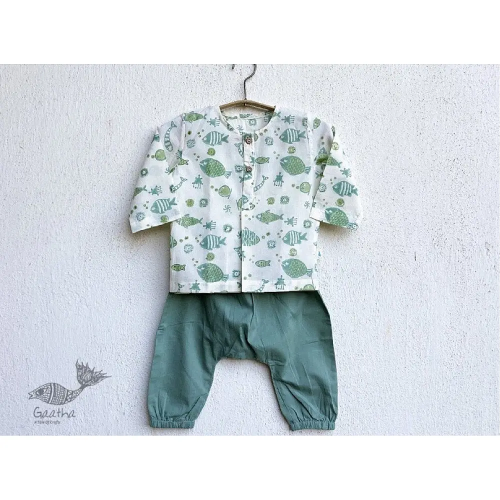 mint green organic cotton full sleeved kids top with green fish prints and matching sage green pants
