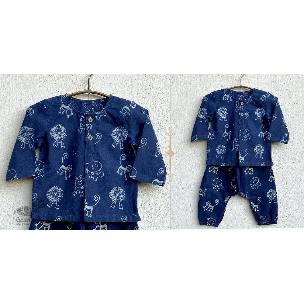 blue organic cotton full sleeved kids top with matching zoo animal printed pants