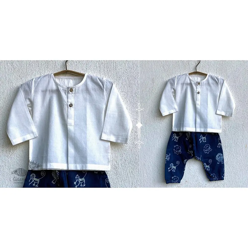 white organic cotton kids shirt paired with indigo blue elephant printed pants