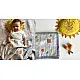 organic cotton kids bedding gift set featuring a cream block printed dhruvtara star dohar blanket sun shaped mustard seed pillow and wooden maracas