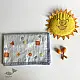 organic cotton kids bedding gift set featuring a cream block printed dhruvtara star dohar blanket sun shaped mustard seed pillow and wooden maracas
