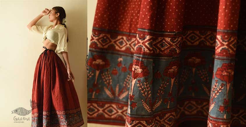 Weaving: woman makes skirt out of banana leaf fibers, some dyed