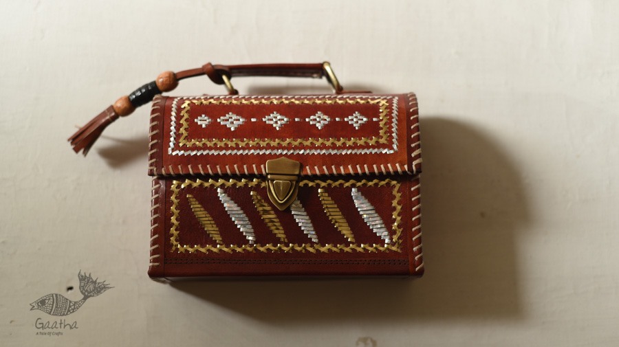 shop Kutchi Leather Sling Handbag