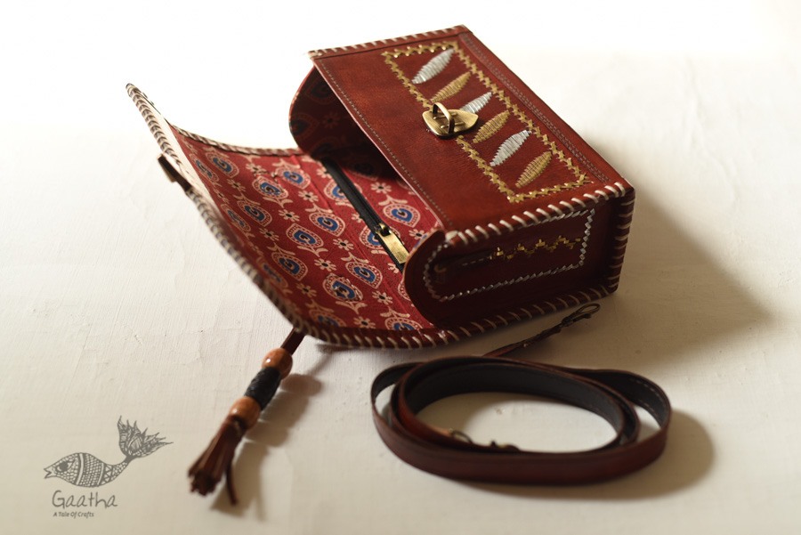 shop Kutchi Leather Sling Handbag