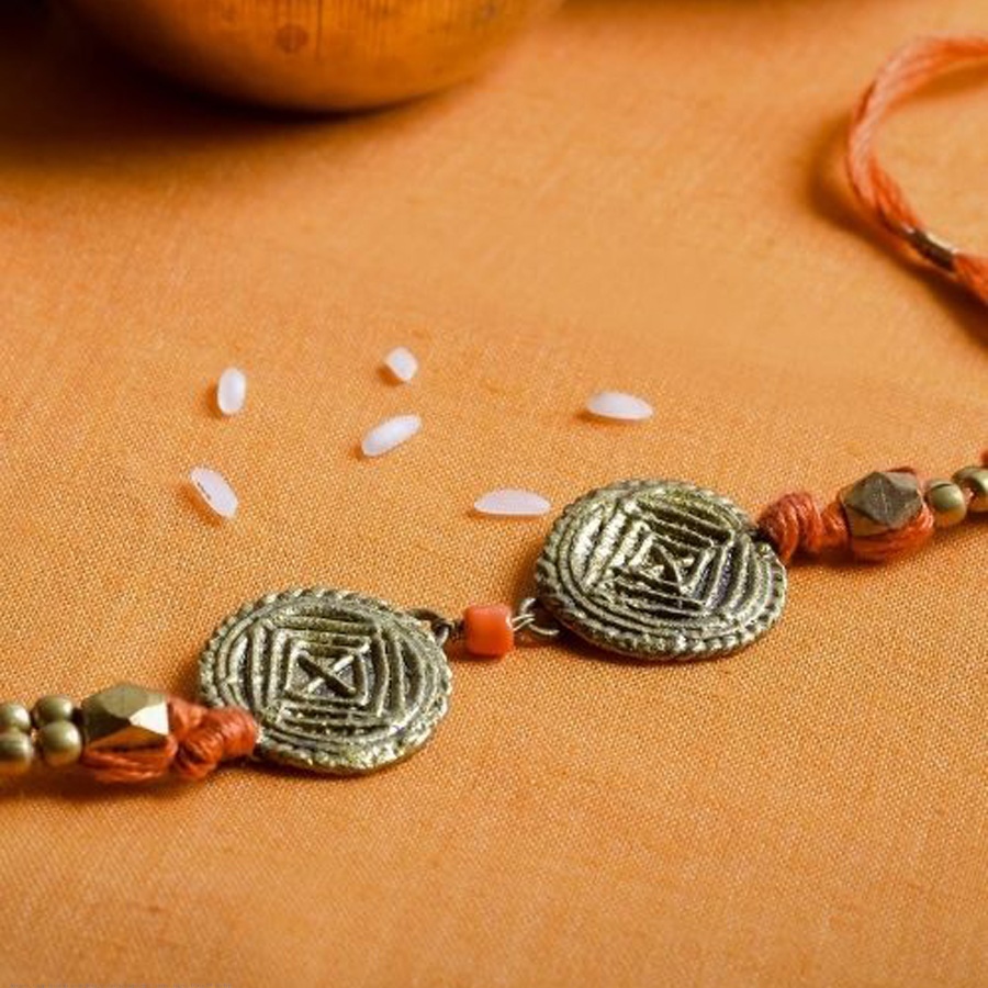 shop handmade dhokra brass rakhi