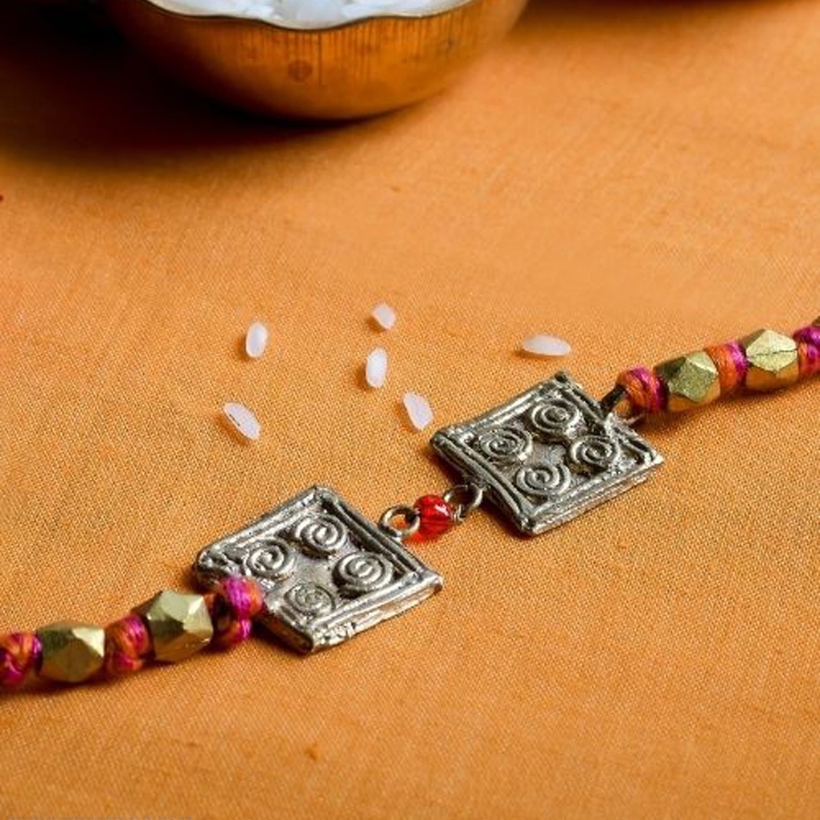 shop handmade dhokra brass rakhi