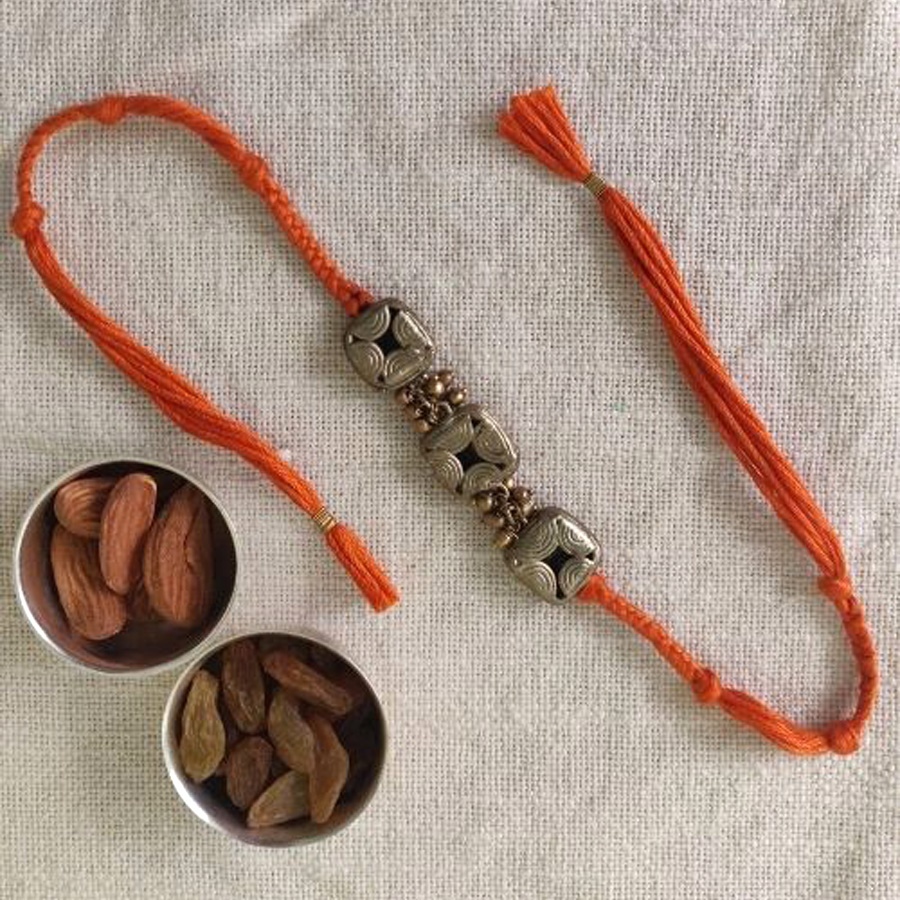 shop handmade dhokra brass rakhi