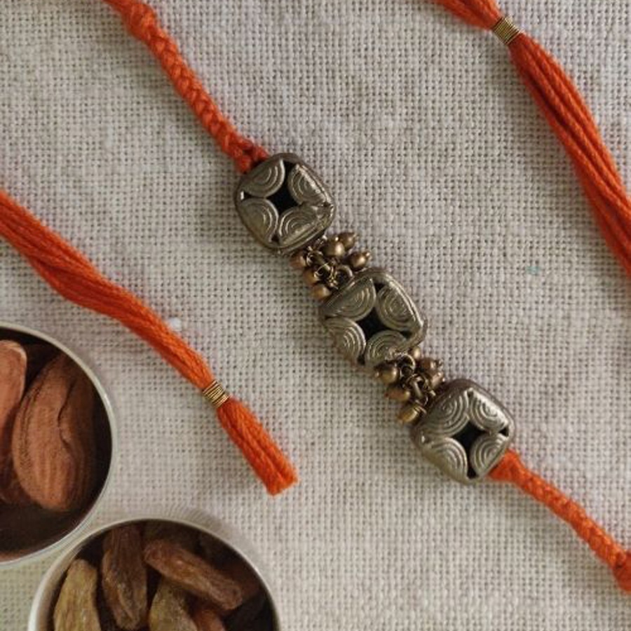shop handmade dhokra brass rakhi