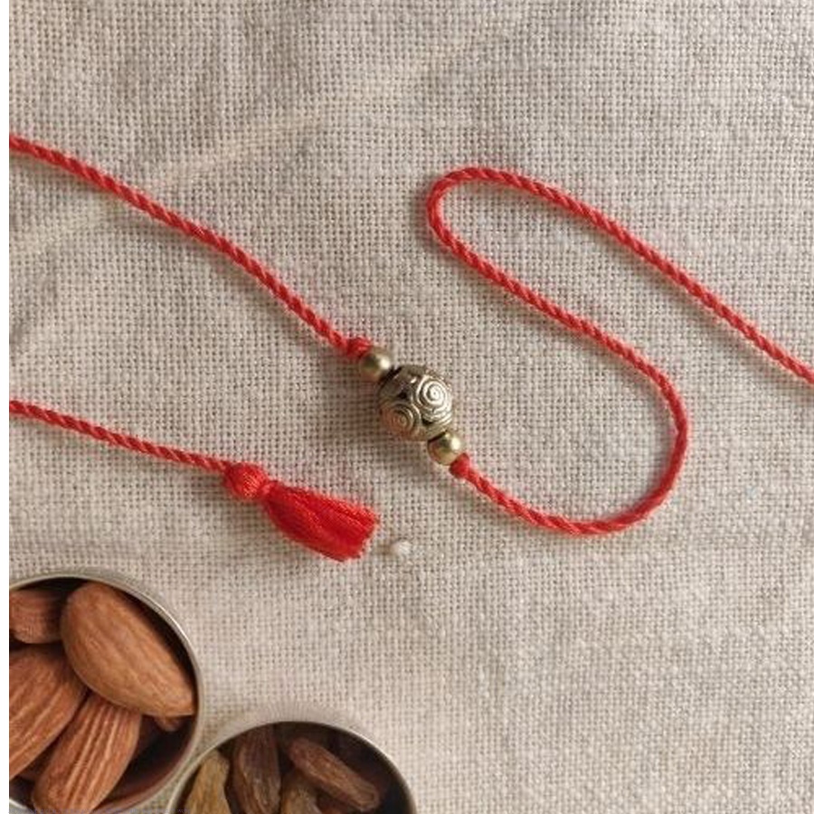 shop handmade dhokra brass rakhi