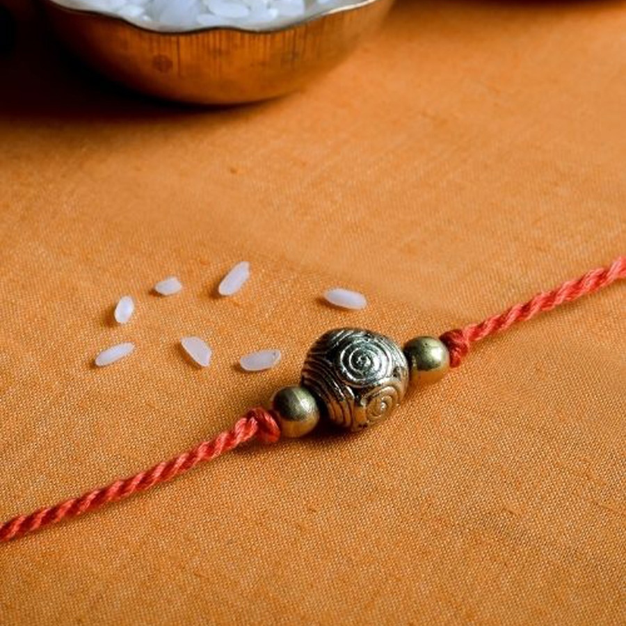 shop handmade dhokra brass rakhi