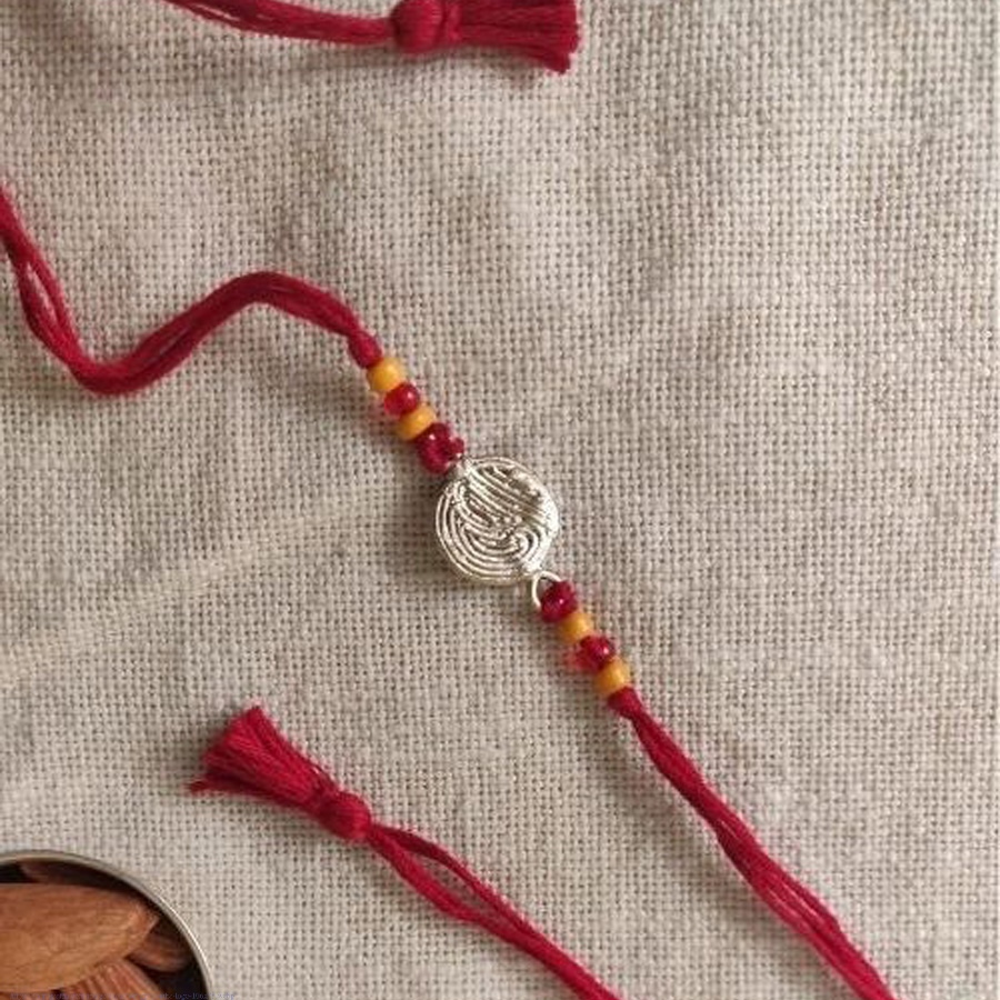 shop handmade dhokra brass rakhi