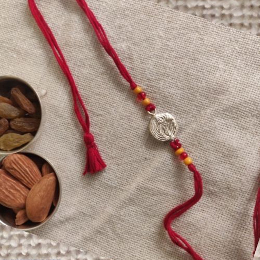 shop handmade dhokra brass rakhi