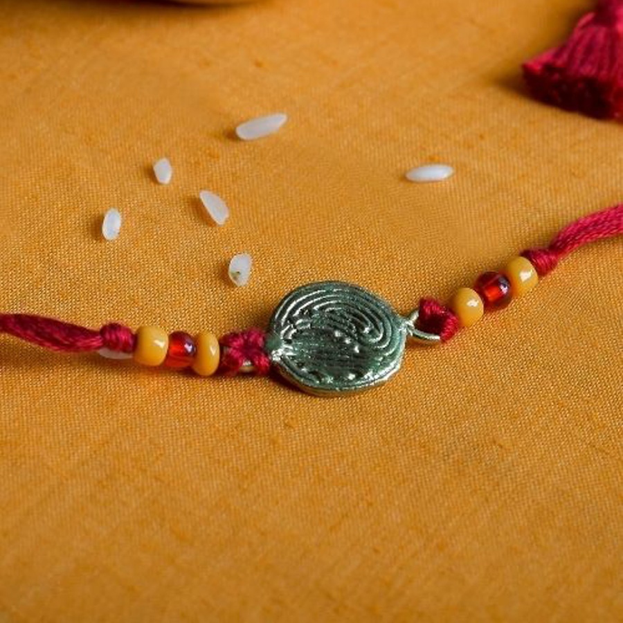 shop handmade dhokra brass rakhi