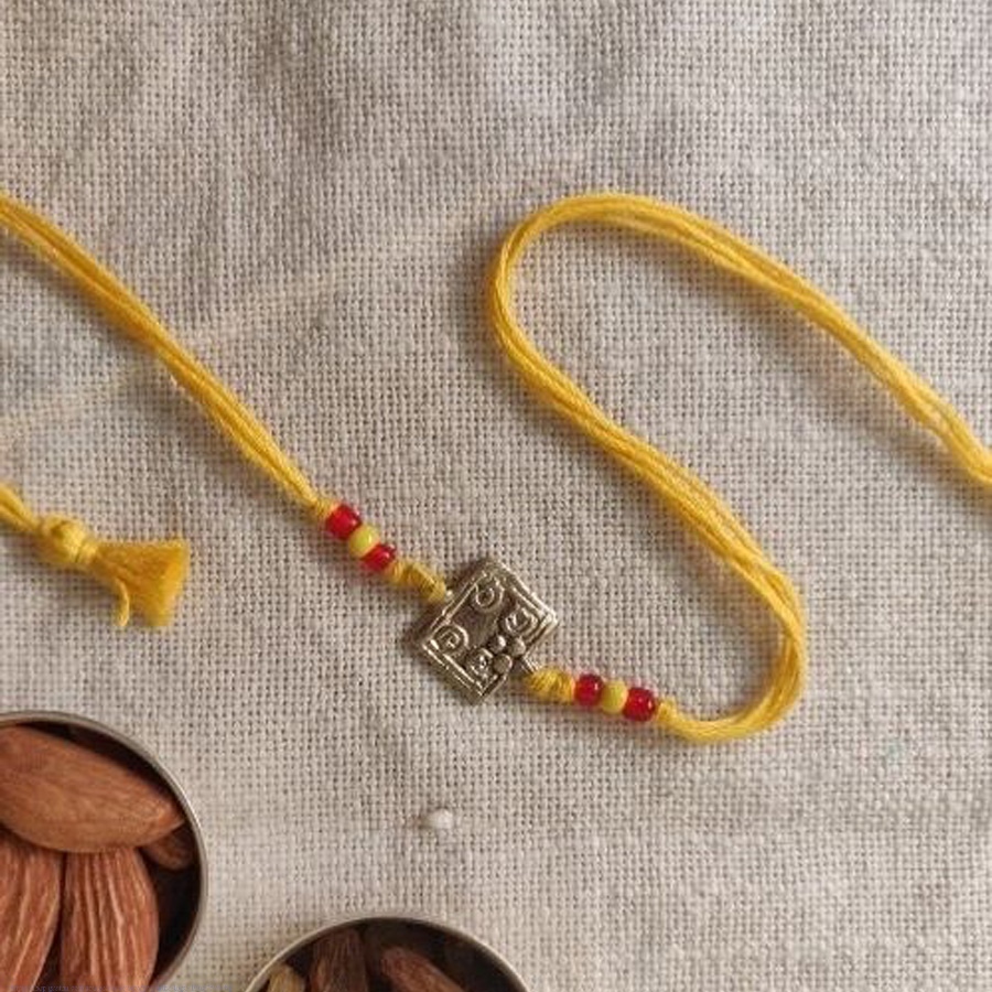 shop handmade dhokra brass rakhi