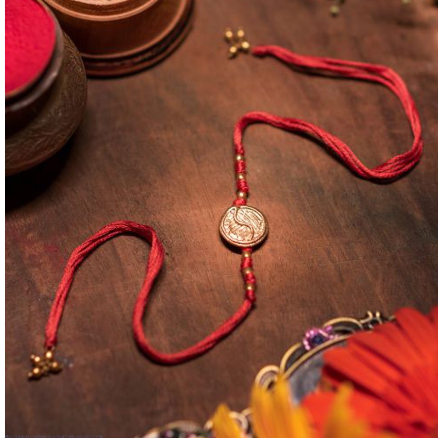 shop handmade dhokra brass rakhi