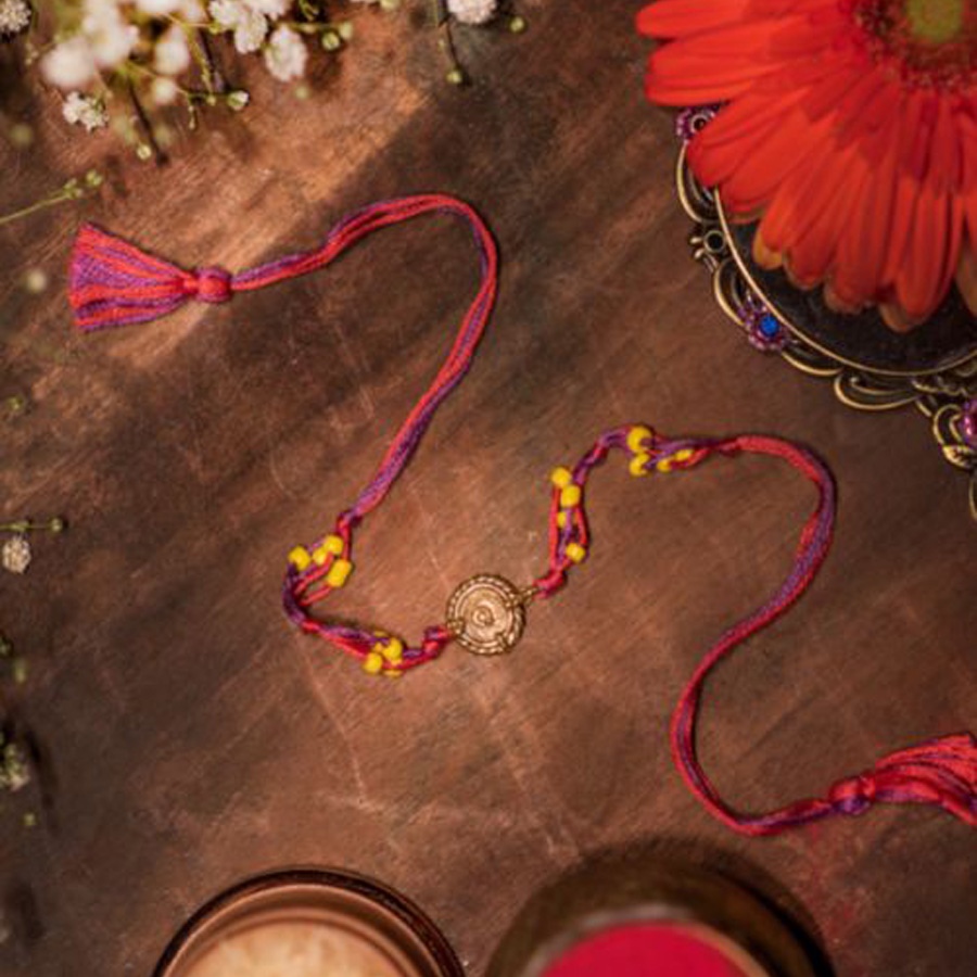 shop handmade dhokra brass rakhi