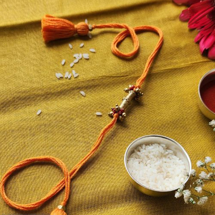 shop handmade dhokra brass rakhi - Pila Dhaga