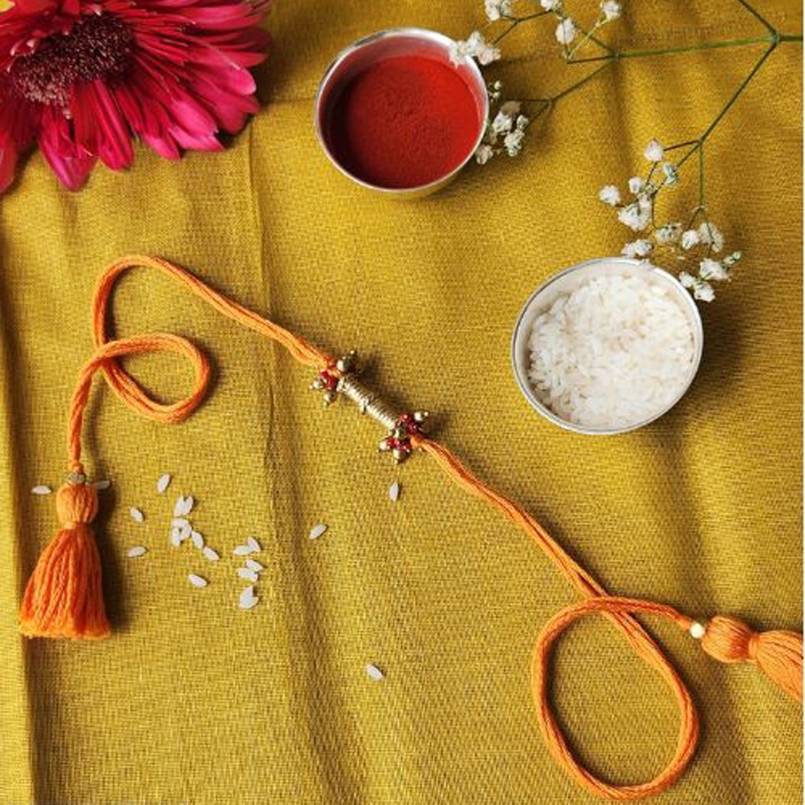 shop handmade dhokra brass rakhi - Pila Dhaga