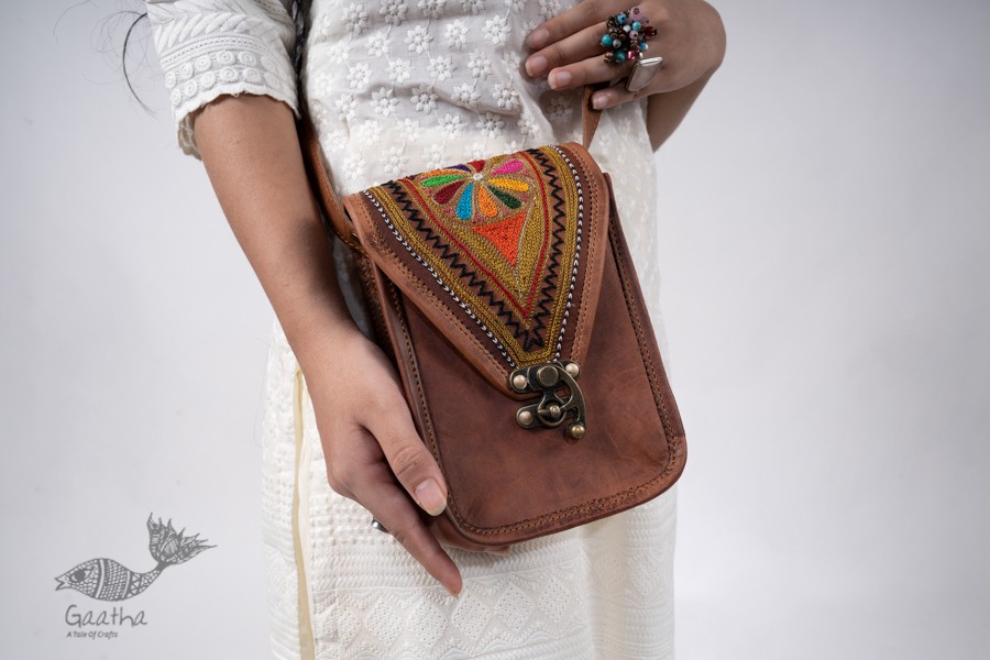 online embroidered leather hand bag