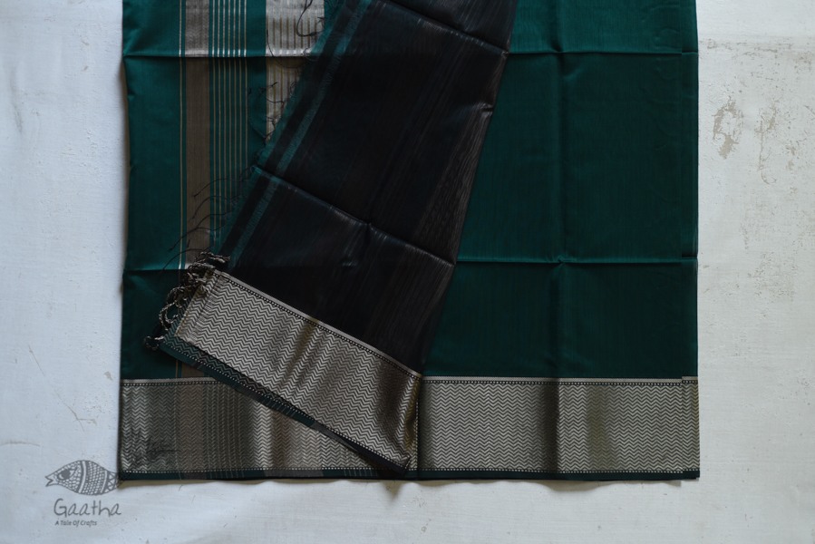 maheshwari handwoven silk dark green saree with golden border