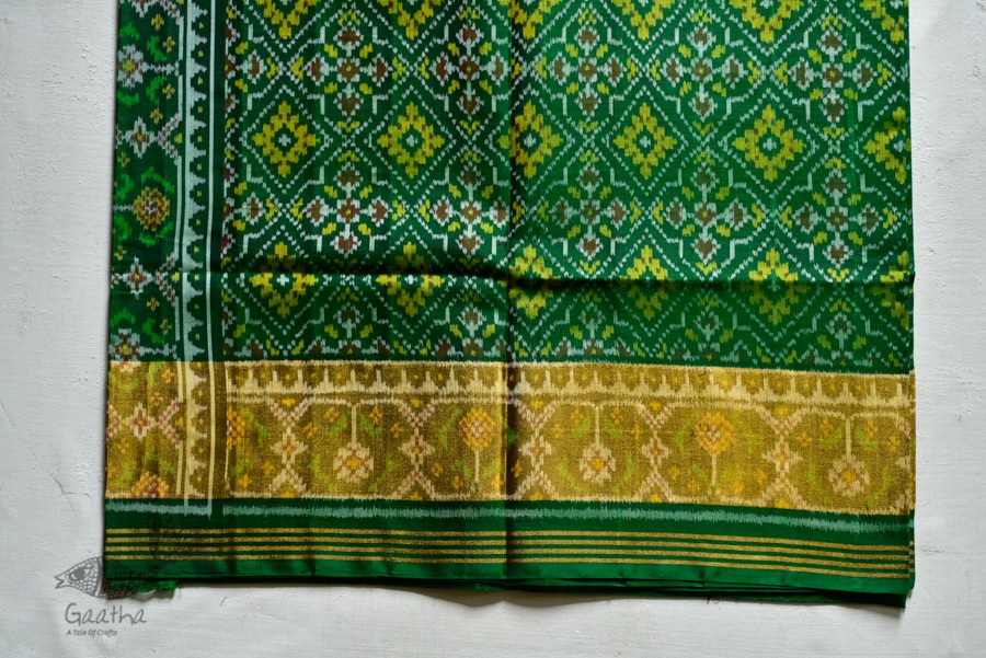 exclusive silk handwoven partola green saree