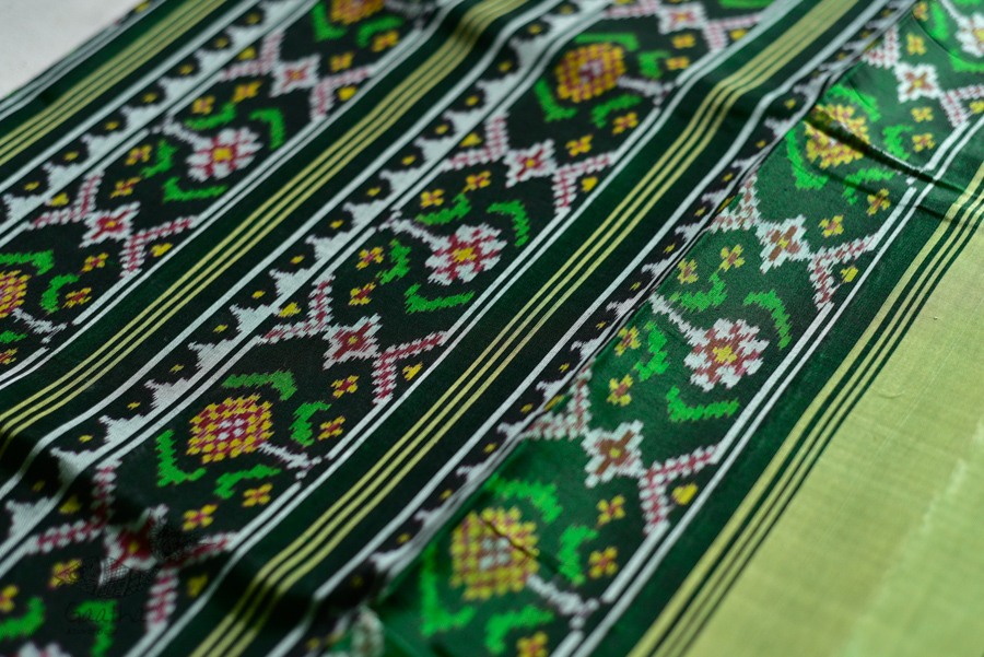 exclusive silk handwoven partola green saree