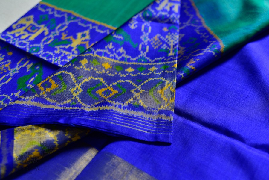 exclusive silk handwoven partola green & blue saree