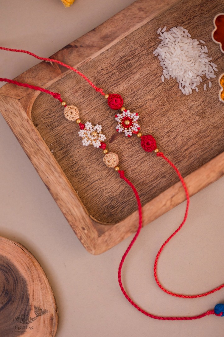 Handmade Crochet Rakhi (Set of 2) - Red & White Beads Flower Rakhi