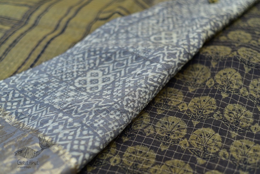 Organza ajrakh printed saree with zari border