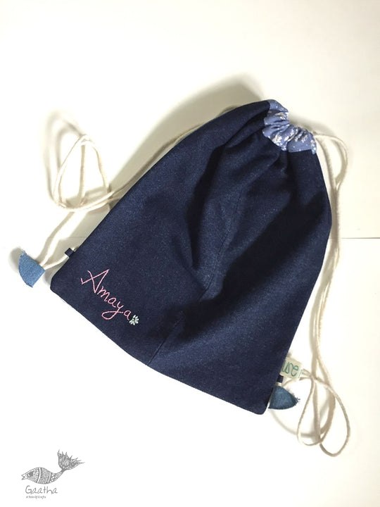 shop Denim Drawstring Backpack